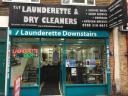 T&T Dry Cleaning & Launderette logo